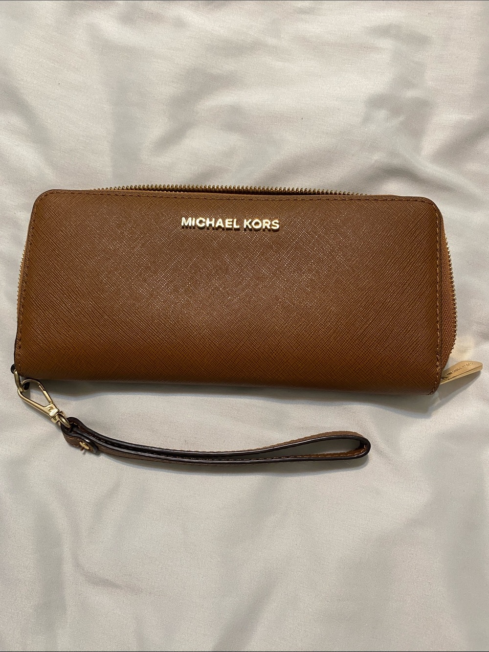 Michael Kors Cognac Saffiano Leather Zip Wristlet with Gold Logo
